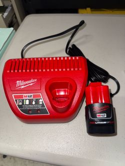 Milwaukee battery and charger new