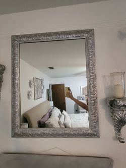 Mirror with two sconces and shelf