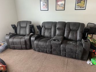 Faux leather rocking and reclining couch set
