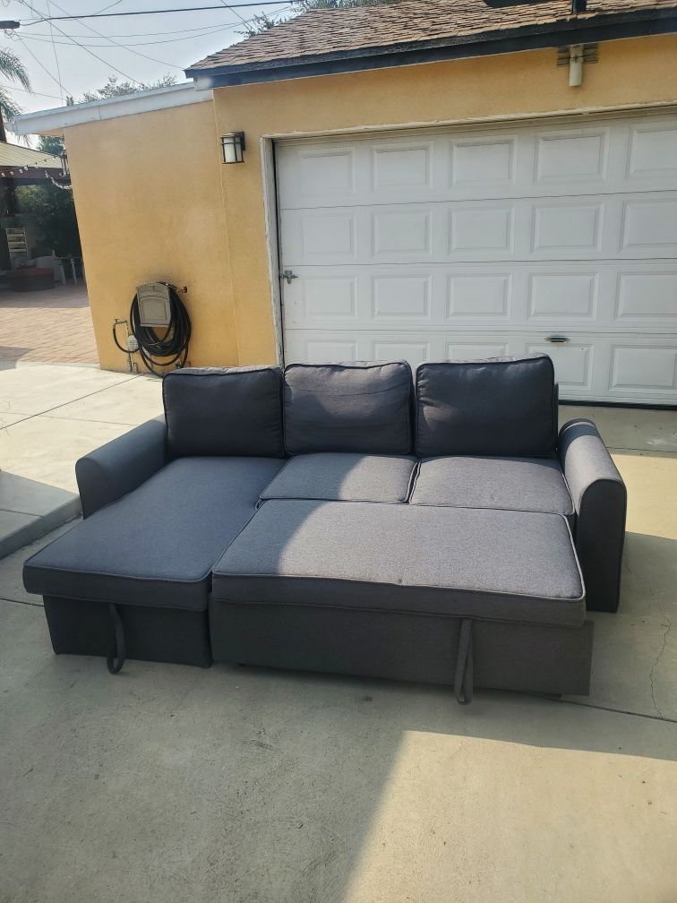 Sleeper Sofa bed. Excellent condition. No stains. Basically new condition