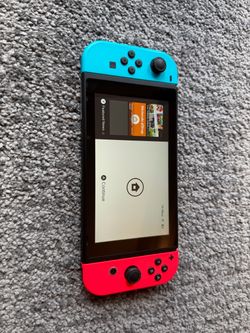 Nintendo Switch with Neon Blue and Red Joy-Cons