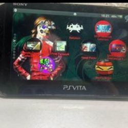 Black Sony Playstation Vita With Games and charger
