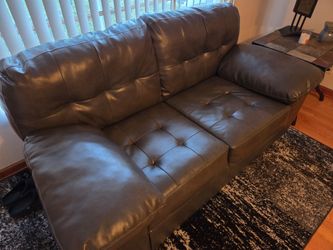 Leather Couch & Love Seat With Coffee Table