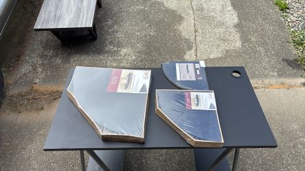 Three different size corner shelves