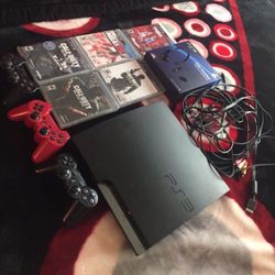 PS3 with 3 controllers,5 games and chat headset