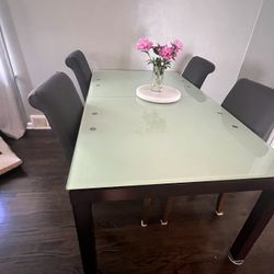 Glass Dinning Table And  Chairs 