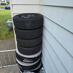 Steal Wheels with Michelin X-Ice Snow tires 205/60R16