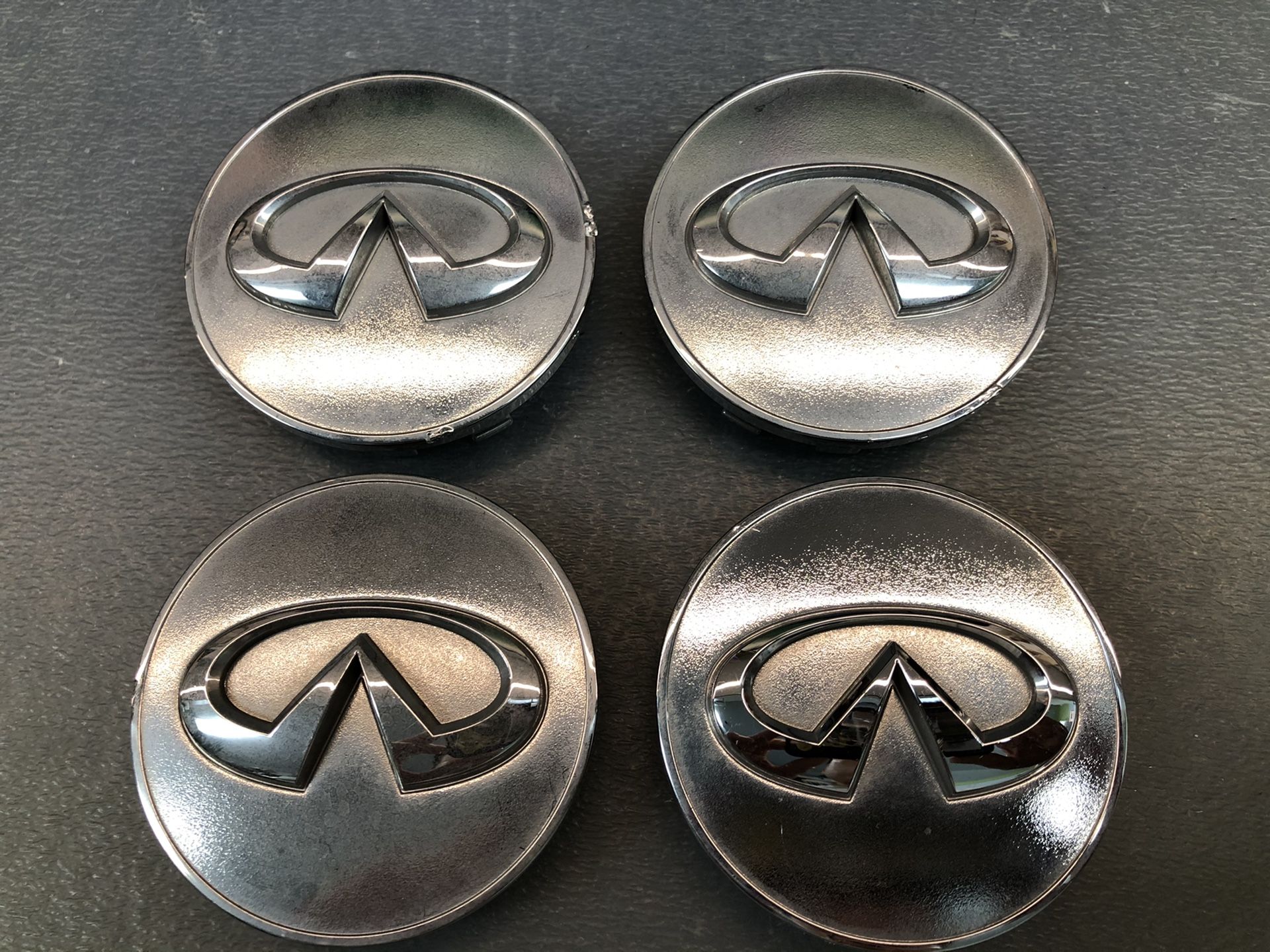 Nissan / Infiniti OEM Factory wheel center hub caps