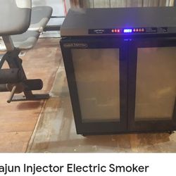 CAJUN I INJECTOR ELECTRIC SMOKER!! CAN DELIVER! GENTLY USED ASKING $75 CAN DELIVER!! WORKS GREAT!! ASKING $75