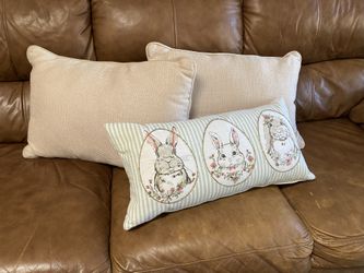 Three decorative pillows