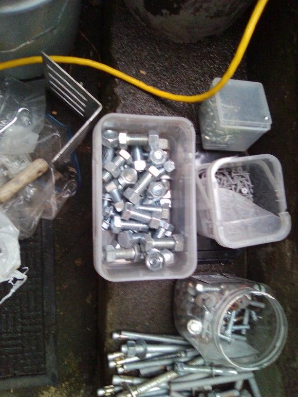I've Got A Whole Bunch Of Hardware Here Fellas I Got Big Tie Downs I Got Anchors I Got All Kinds Of Hardware Here