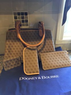 Dooney and Bourke signature beige satchel with accessories in excellent condition