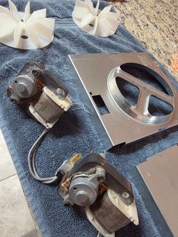 Bathroom /laundry room fan motors brackets and fans, work good