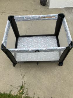 Graco portable playard.  Length: 40 inches Width: 28 inches Depth: 24 inches