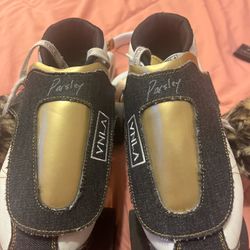 Gold And Black Vnla Skates