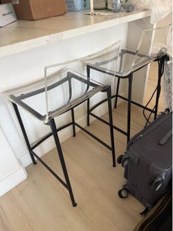 2 clear barstools