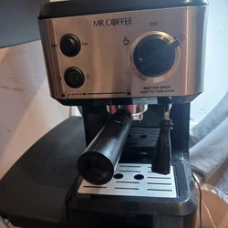 Mr. Coffee steam espresso maker,and frothing milk for cappuccinos or lattes.