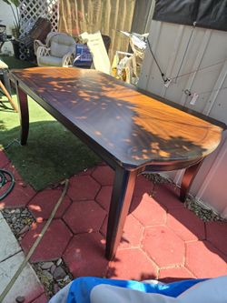 Dark Brown Wooden Dining Table Mahogony