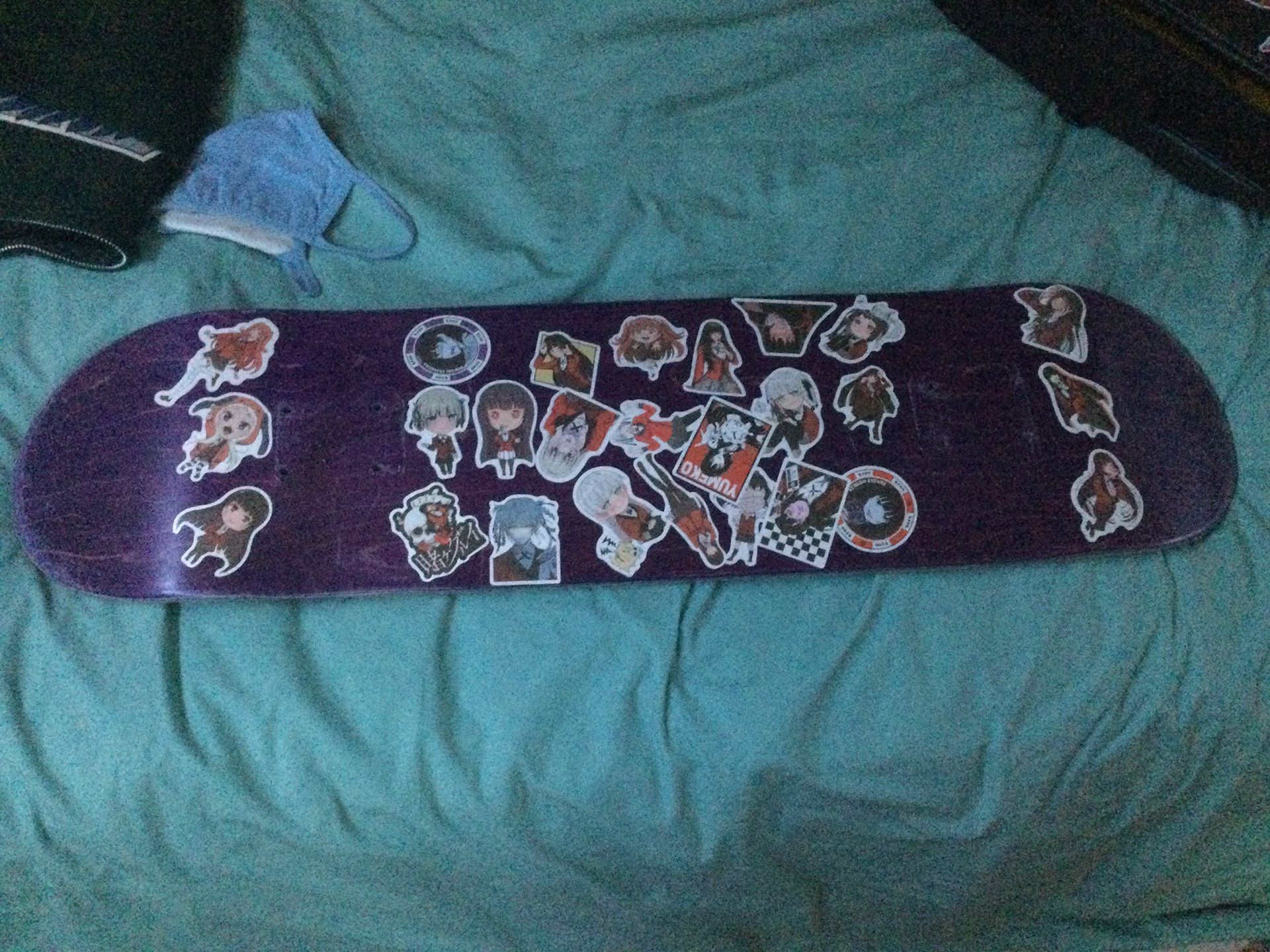 Purple 7.75 Skateboard Deck. ( Has Stickers )