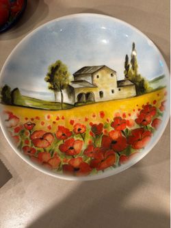 8” decorative bowl with a field of red poppies