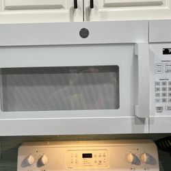 NEW WHITE GE OVER THE RANGE MICROWAVE 