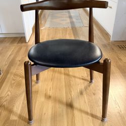 Four Mid Century Modern Chairs