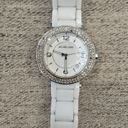 Michael Kors Women's white ceramic watch.