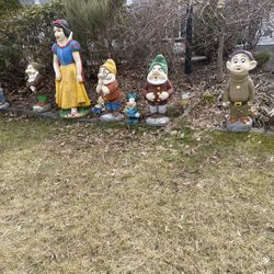Vintage Snow White and the seven dwarfs cement garden statues