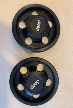 2 Jeep wheel center caps