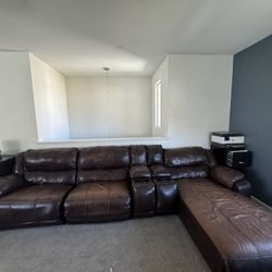 Brown Sectional Leather Couch With Two Recliners And A Chase