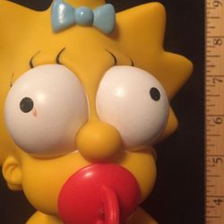 NUDIST MAGGIE SIMPSON VINYL DOLL 15085