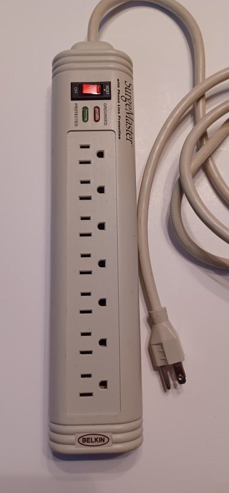Surge protector with phone line protection