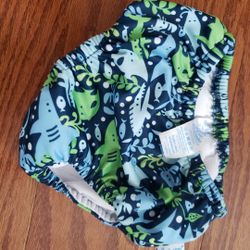 I play reusable swim diaper 18m blue with sharks and fish.