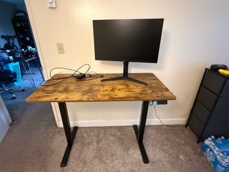 Height adjustable table