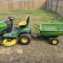 John Deere S130 Riding Lawn Mower with Y8 dump cart. Only 15.7 run hours!!