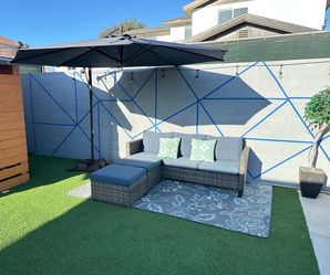 Outdoor Seating lounge with umbrella & rug