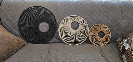 "Set of 3 boho woven rattan wall hangings in black, natural, and brown tones. Perfect for a modern boho vibe in any room! Excellent condition.