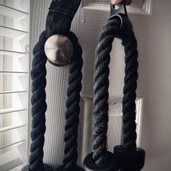 Triceps pull down rope (cable) with attachment.