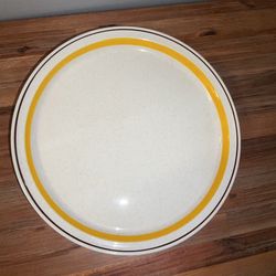 Vintage ceramic cutting plate or platter, yellow rim