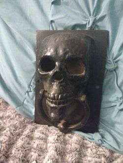 Metal skull door knocker