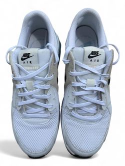Nike Air Max Excee sneakers in white, light aqua/blue and cream with black Nike Swoosh.