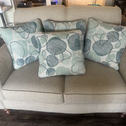 Couch with pillows / loveseat / sofa