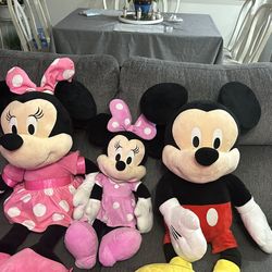 Mickey Mouse and Minnie Mouse jumbo plush with a regular Minnie Mouse all by Disney. 