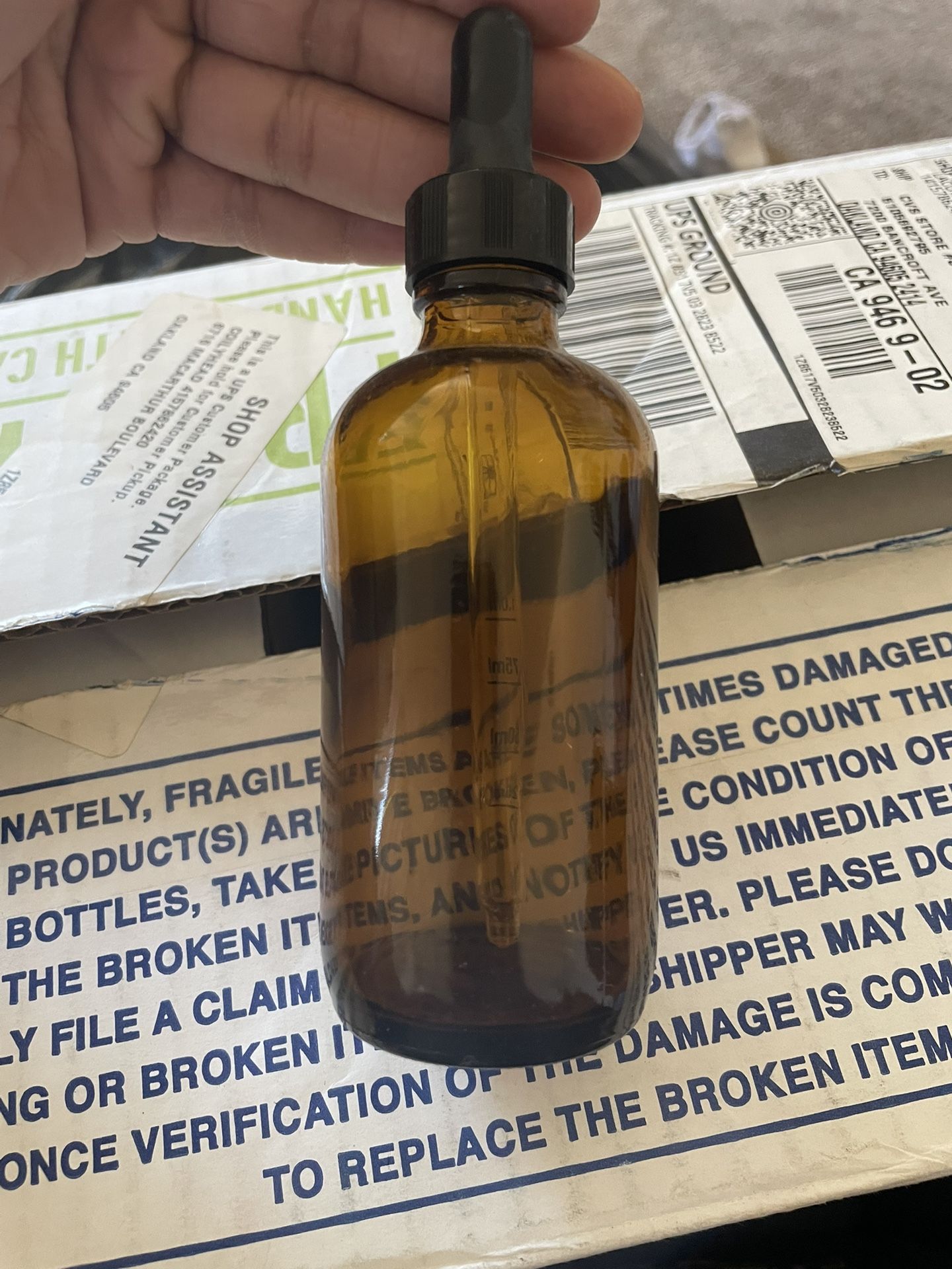 4 oz. Amber Boston Round with Black Glass Dropper