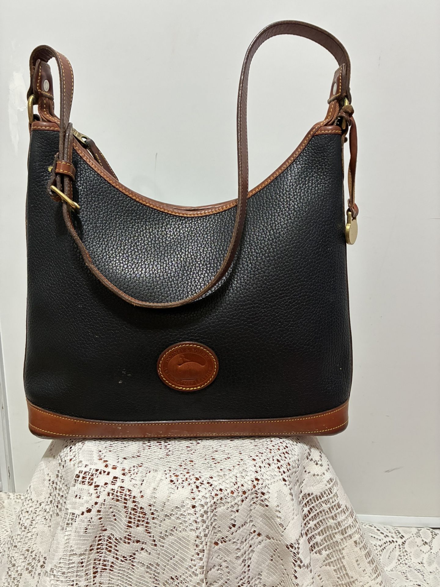 Genuine Vintage Dooney and Bourke large black and tan shoulder bag