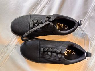 Kids black lace-up sneakers by Art Class (Target brand), style “Garrett.” Size 1, brand new with tags still attached.
