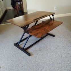 FEZIBO  ADJUSTABLE WORK DESK  HYDRAULIC   MECHANISEM. 150.00