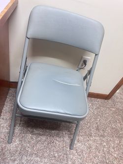 Silver Cushioned Folding Chair (cosmetic damage on seat)
