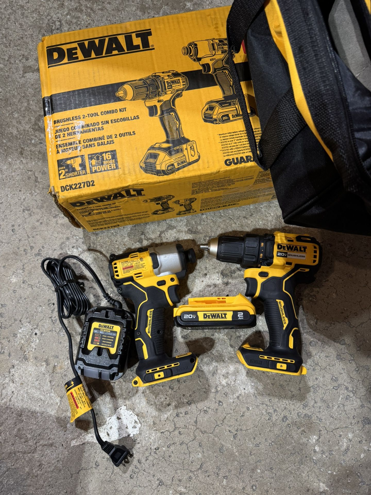 Dewalt 20 volt brushless set with 1/4” impact gun, 1/2” drill, 2AH battery, charger and bag NEW 2024