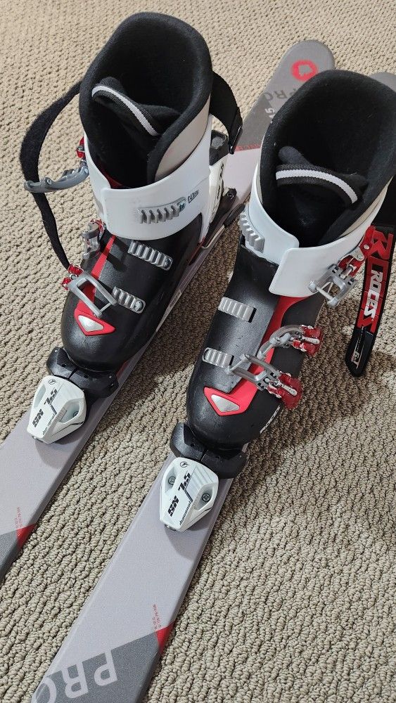 145 defiance skis with adjustable boots for youth size 22.5 - 26 package